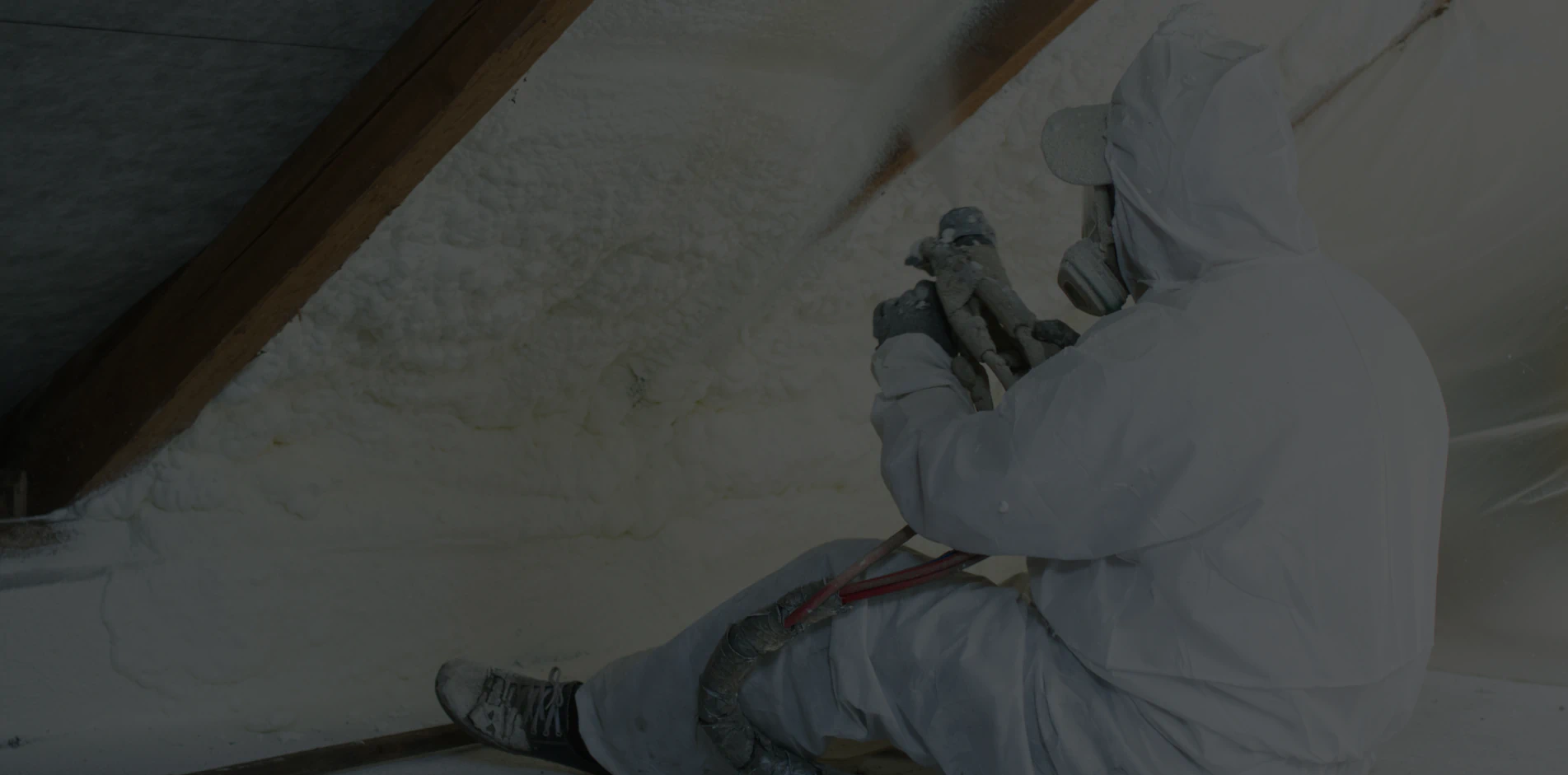 worker doing a foam insulation service